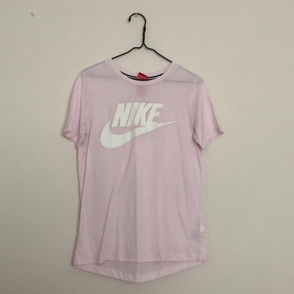 white and pink nike shirt